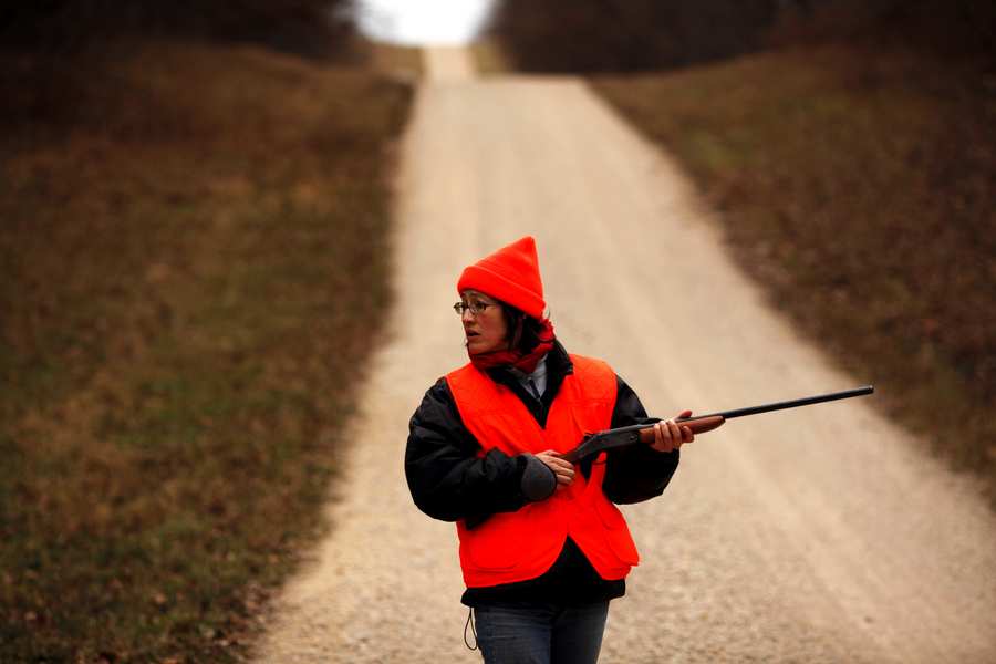 Monica Eng clutches her shotgun while listening for deer during her first hunting season in northern Illinois.  : Moments : Madison | Milwaukee | Chicago | Writer | Photographer | Keri Wiginton | Portrait photography | Travel | Corporate | Photojournalist | Editorial | Environmental
