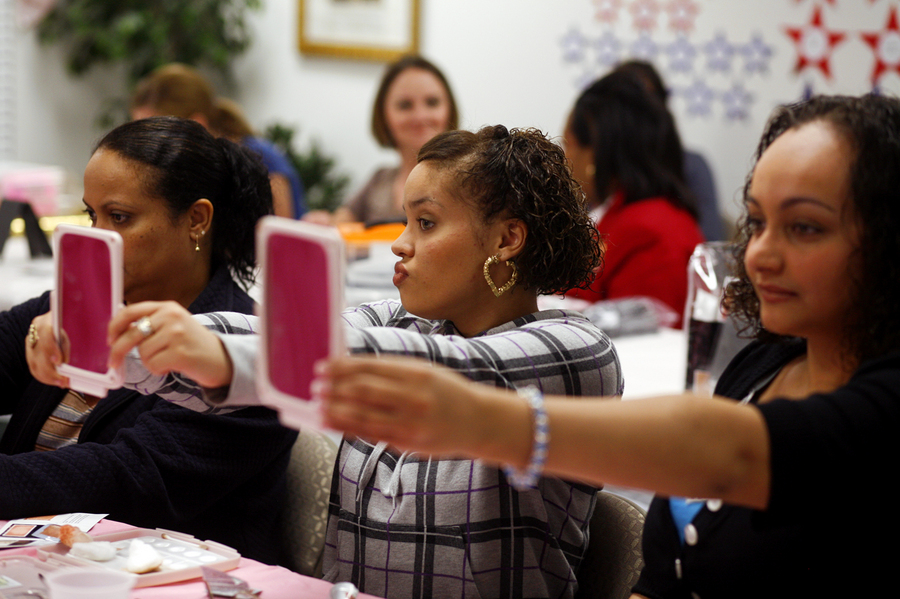 Laura Rodriguez, from left, Natalie Rodriguez, center, and Jessica Ocasio check out their makeup after receiving tips at  Mary Kay meeting.  : Moments : Madison | Milwaukee | Chicago | Writer | Photographer | Keri Wiginton | Portrait photography | Travel | Corporate | Photojournalist | Editorial | Environmental