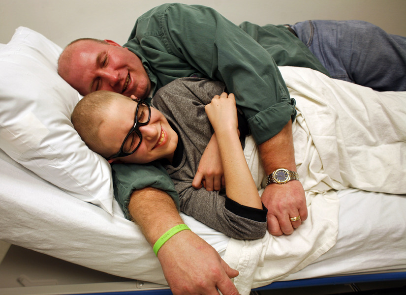 David Salyer, top, and son Shane joke around during a seven-hour visit to St. Joseph's Hospital in Tampa, Fla, for Shane's cancer treatment. "You never know what's going to happen," said David Salyer, who said Shane might have a clot in his heart.   : Moments : Madison | Milwaukee | Chicago | Writer | Photographer | Keri Wiginton | Portrait photography | Travel | Corporate | Photojournalist | Editorial | Environmental