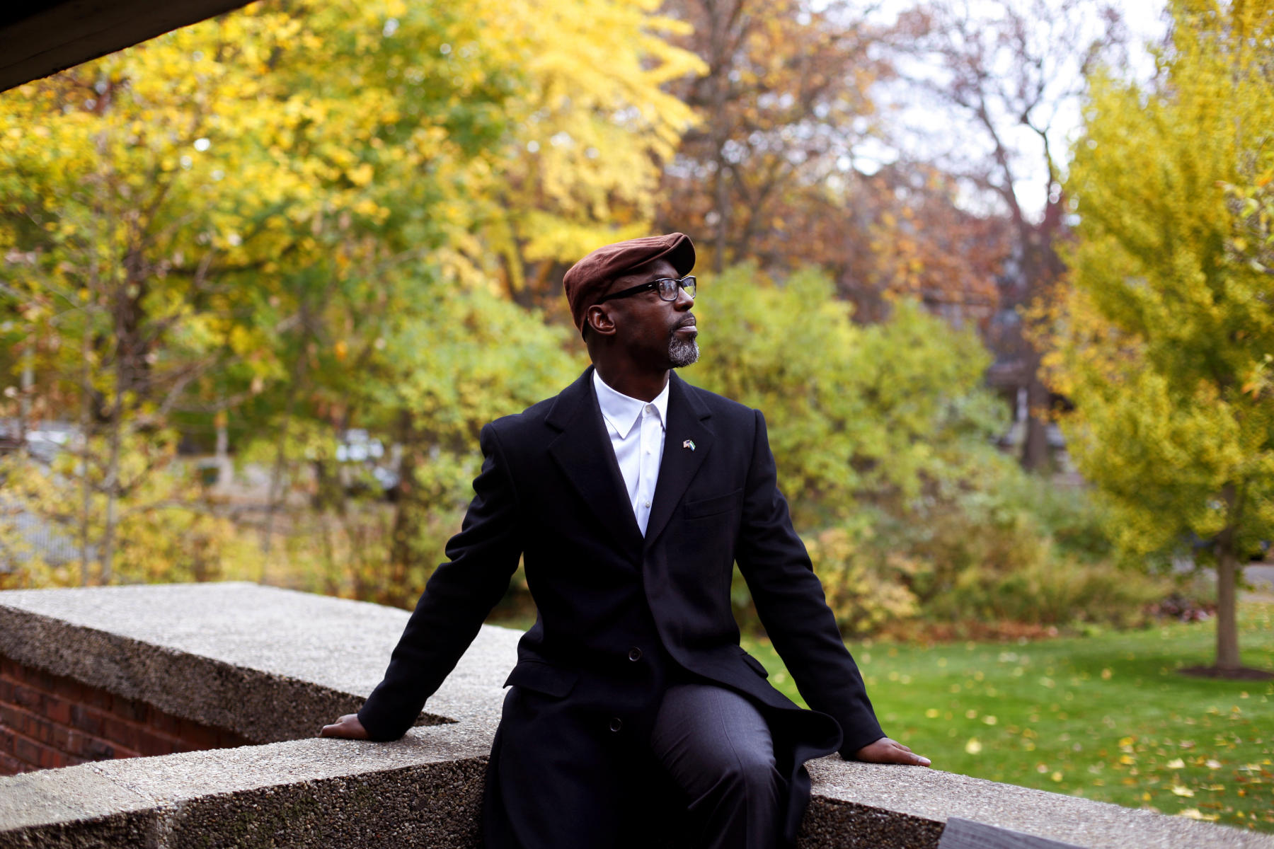 Actor Isaiah Washington, a fan of Frank Lloyd Wright, sits on the back porch of the Peter A. Beachy house in Oak Park, Ill.  : People : Madison | Milwaukee | Chicago | Writer | Photographer | Keri Wiginton | Portrait photography | Travel | Corporate | Photojournalist | Editorial | Environmental