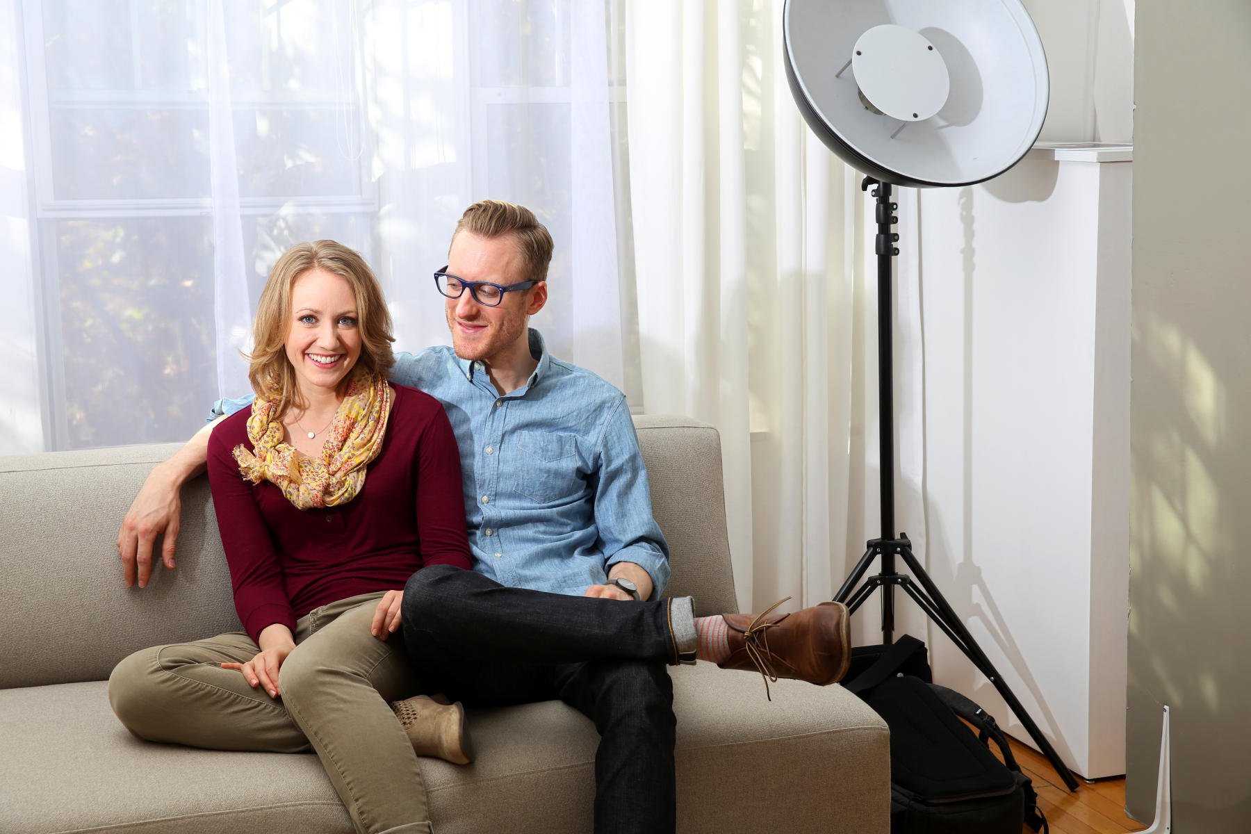 Anne and Steve Truppe sit in the Ravenswood apartment where they run their photography business, Tru Studio.  : People : Madison | Milwaukee | Chicago | Writer | Photographer | Keri Wiginton | Portrait photography | Travel | Corporate | Photojournalist | Editorial | Environmental